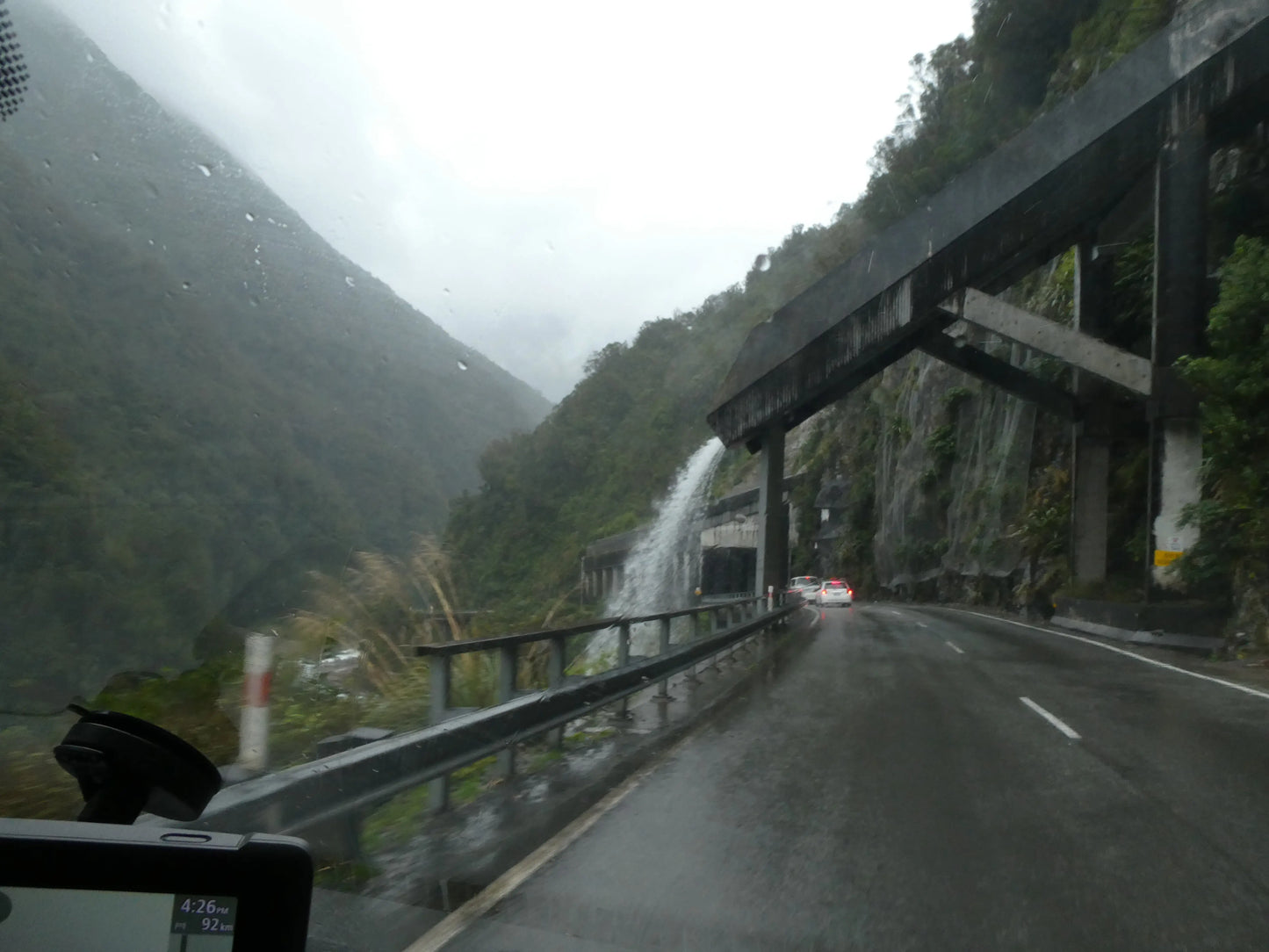 Driving through Arthur's Pass and the Otira Viaduct in the rain, South Island, New Zealand.