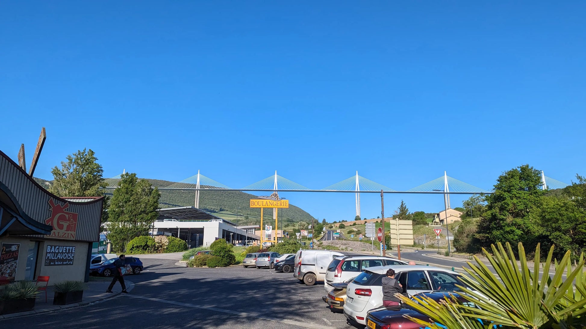 Looking up at the towering pillars of the Viaduc de Millau from the valley floor in Southern France.